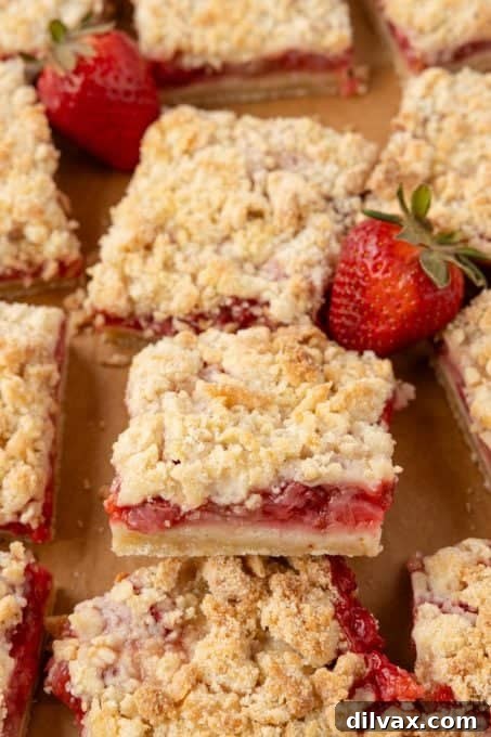 Close-up of baked Strawberry Bars showing the crumb topping