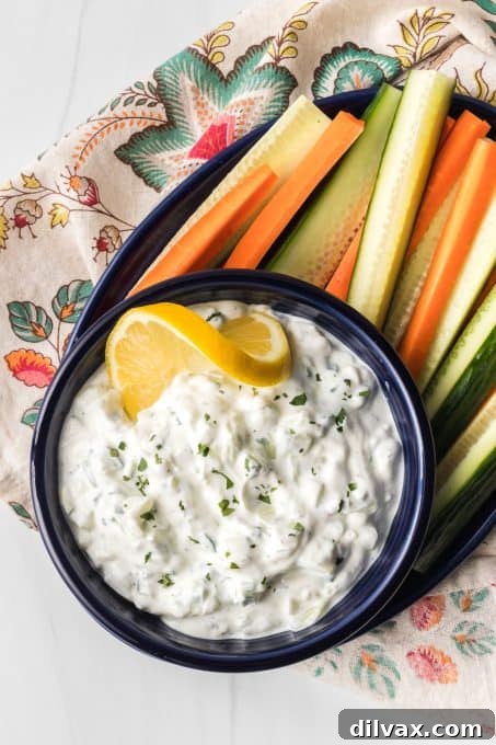 Effortless Greek Tzatziki Dip 3 Fresh Tzatziki Sauce in a bowl, ready to serve.