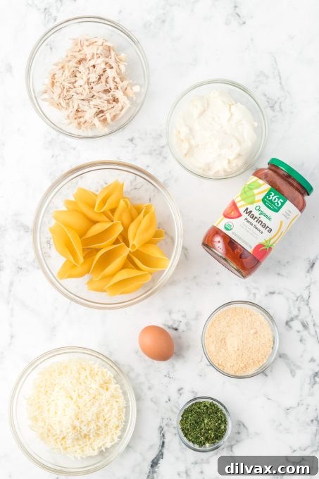 Ingredients for Chicken Stuffed Shells laid out on a counter