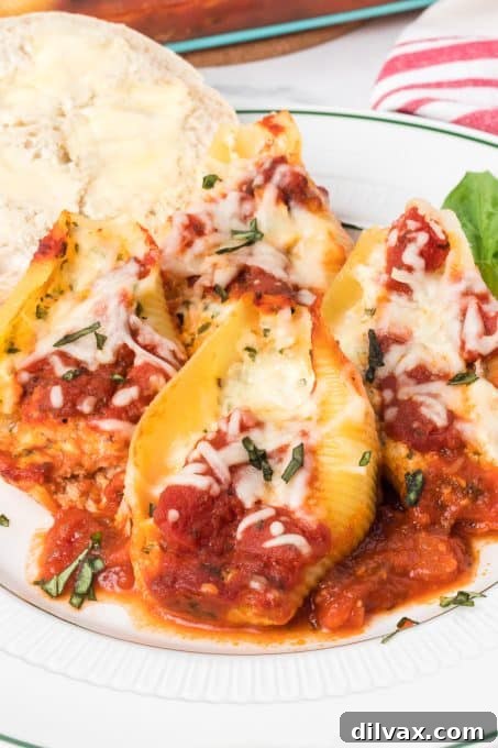 Stuffed cheese shells with chicken, garnished and ready to eat