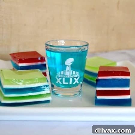Game Day Jelly Shots - cubes of flavored gelatin in your favorite team colors spiked with flavored vodka for extra fun!