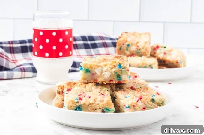 4th of July Gooey Butter Bars with red, white, and blue sprinkles