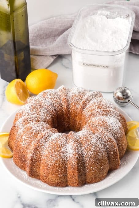 A beautifully baked Bundt cake featuring lemon juice, zest, and olive oil.