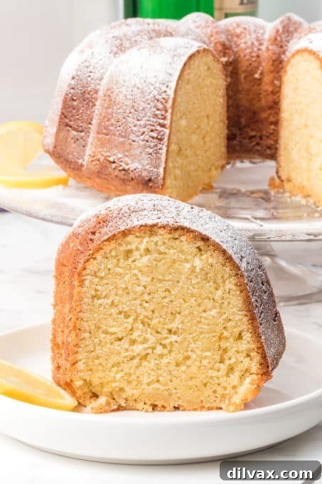 A rustic image of a delectable Lemon Cake made with olive oil.