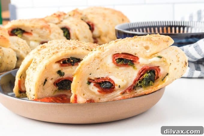 Freshly baked Spinach Pepperoni Bread, golden brown and ready to slice.