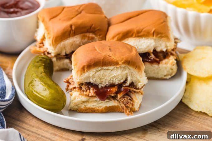 BBQ Chicken Sliders, perfect for parties, game days, and easy weeknight dinners. Features tender pulled chicken on soft buns.