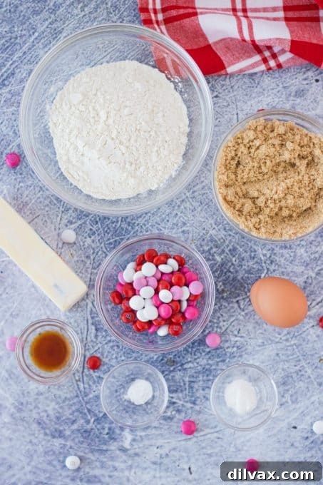 Ingredients for M&M Valentine Blondies laid out on a surface.