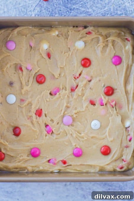 Valentine Blondies batter in a pan, ready to be baked in the oven.