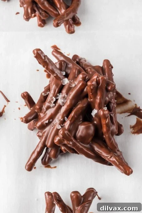 Golden Stacks 3 A close-up shot of perfectly formed Haystack cookies, dusted with sea salt.