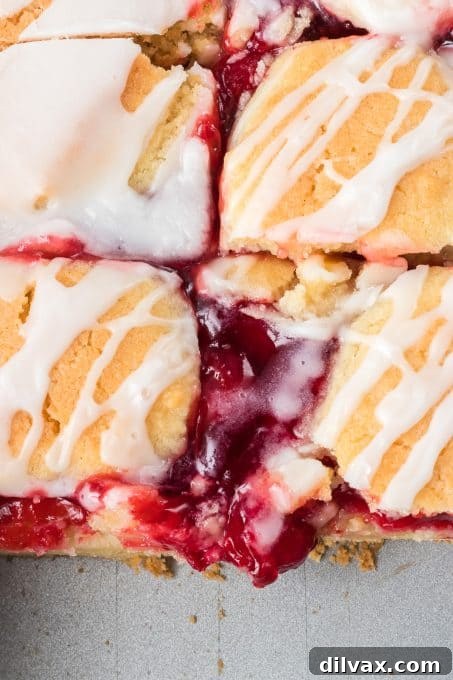 Delicious Cherry Pie Bars, glazed and ready to serve.