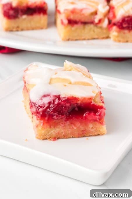 Easy pie bars made with convenient store-bought cherry pie filling.