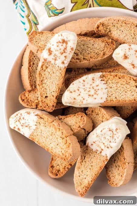 Biscotti dipped in white chocolate and sprinkled with cinnamon.