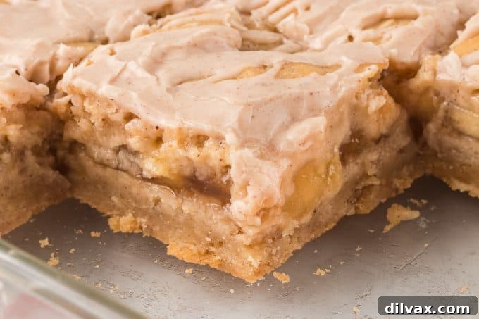 Apple Crumble Bars 12 Pie bars with a spiced shortbread crust and apple pie filling, ready to serve.