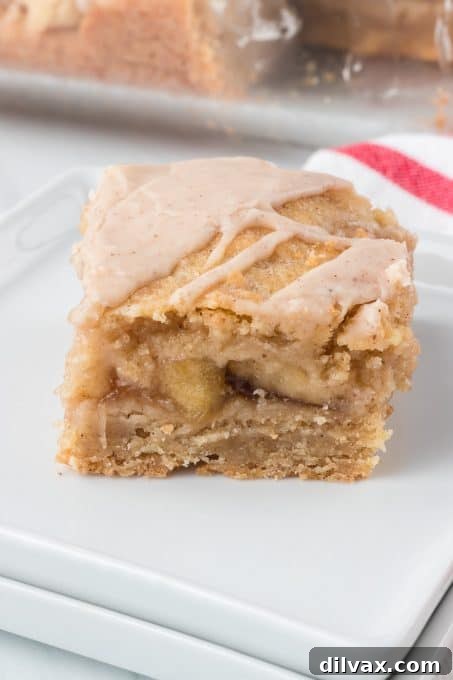 Apple Crumble Bars 10 Apple pie filling visible in shortbread crust pie bars.