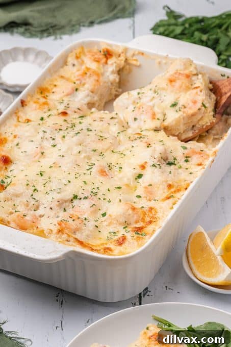 Oceanic Lasagna 8 A freshly baked pan of seafood lasagna, with a golden-brown top and bubbling edges, inviting to be served.