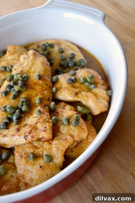 Beautifully plated Chicken Piccata, a classic Italian-American dish.