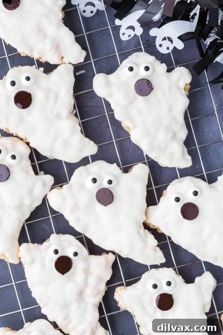 Stacked Halloween Ghosts made from Rice Krispie cereal, showcasing their texture
