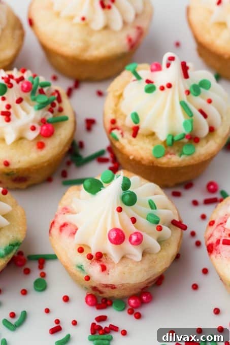 Yuletide Cookie Delights 9 A tray filled with beautifully frosted Christmas Cookie Cups, ready for a holiday celebration.