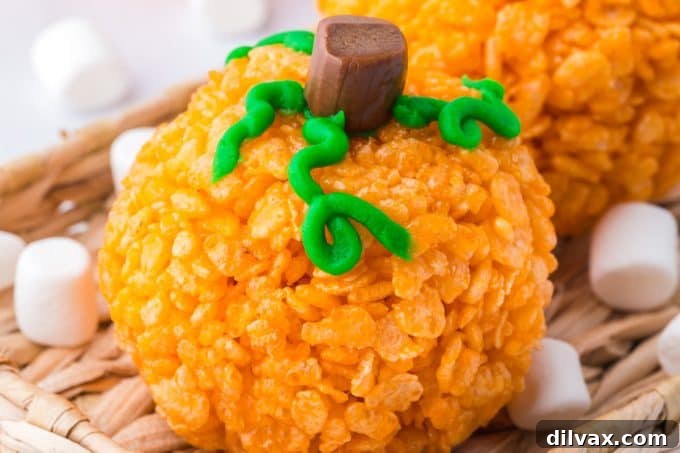 Halloween Pumpkin Rice Krispie Treats - a sweet and chewy fall dessert