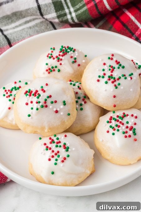 Pillowy Ricotta Delights 10 A festive display of glazed Ricotta Cookies, ideal for holiday gatherings.