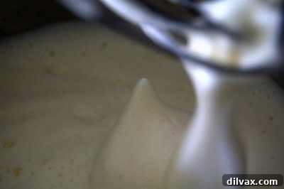 Lemon Vanilla Pound Cake batter in Bundt pan before baking, showing its smooth consistency.