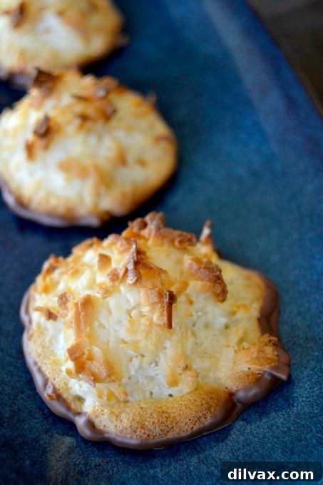 Chewy Coconut Delights 13 A plate of perfectly baked coconut macaroons, inviting and delicious