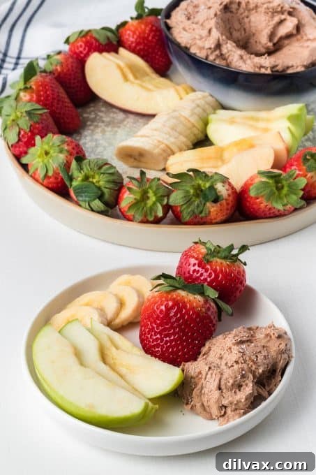 Luscious Chocolate Peanut Butter Fruit Dip 6 Fresh fruit platter with a bowl of chocolate peanut butter fruit dip.