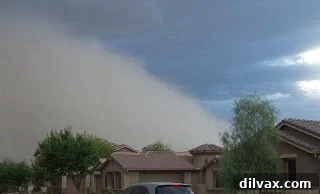 Closer view of the haboob, a dense cloud of dust moving swiftly