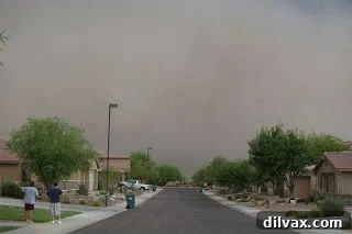 Haboob engulfing houses, visibility decreasing dramatically