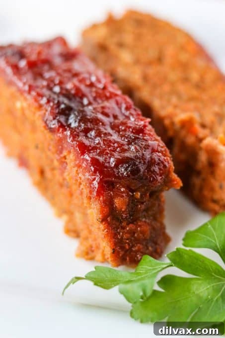 Glaze or sauce on top of the meatloaf.