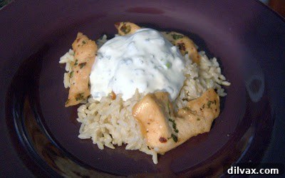 Cooked chipotle chicken strips on a baking sheet