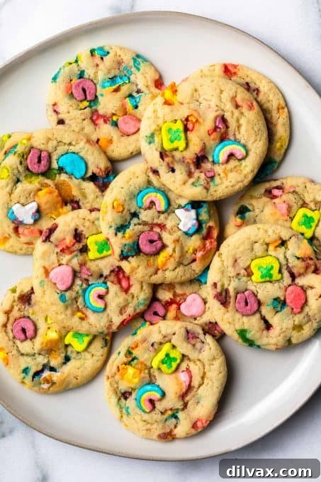 Cookies baked with colorful Lucky Charms marshmallows visible throughout.