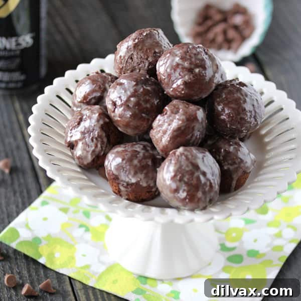 Bite-sized donut holes with a dark chocolate and Guinness glaze.