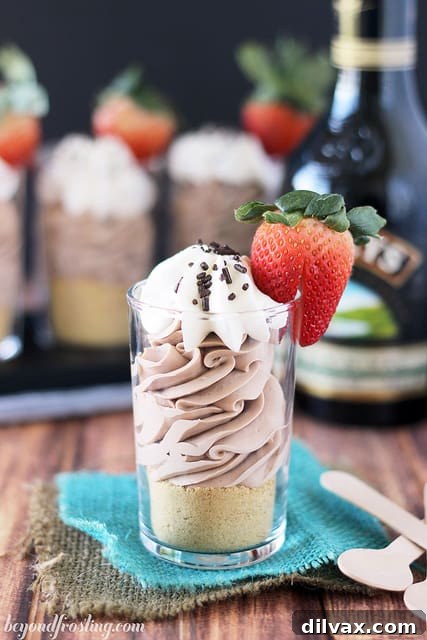 Mini Bailey's Irish Cream cheesecake shooters in small glasses.