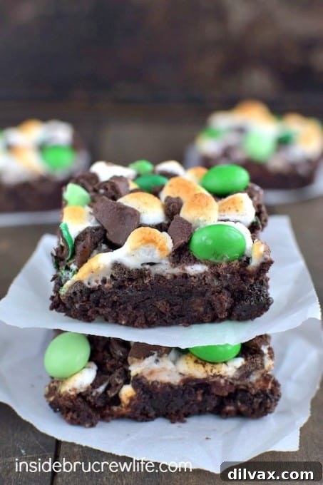 Mint s'mores brownies with melted marshmallows and chocolate.