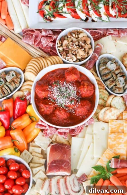 Touchdown Treats: 33 Effortless Game Day Recipes 26 A beautifully arranged Meat and Cheese Board or Charcuterie spread.