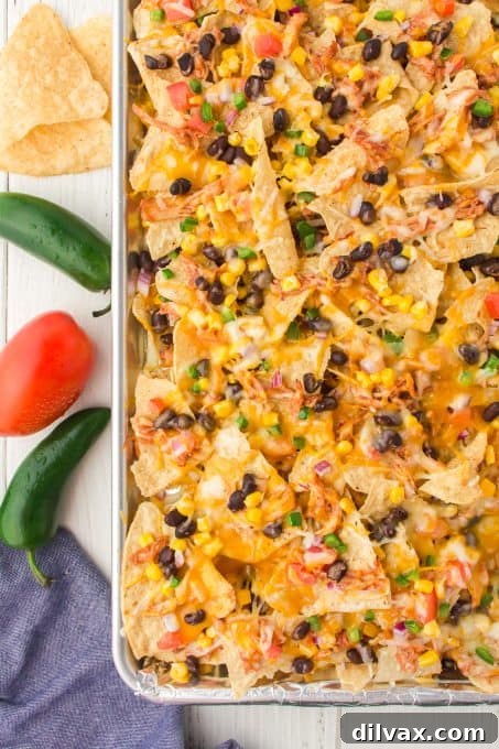Touchdown Treats: 33 Effortless Game Day Recipes 30 A generous platter of BBQ Chicken Nachos with all the toppings.