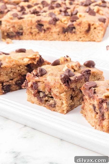 A close-up of a square Banana Chocolate Chip Blondie.