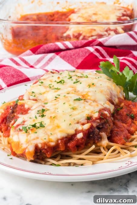 Deliciously Simple Chicken Parmesan 7 Italian chicken with a breadcrumb and Parmesan cheese coating, fried and then baked in pasta sauce.