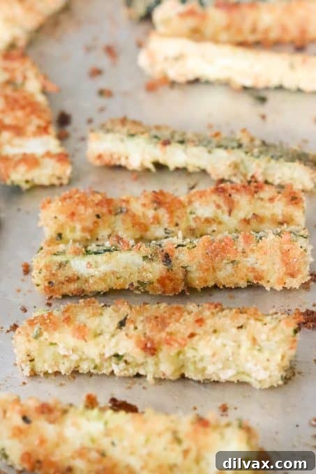 Parmesan Crusted Baked Zucchini Fries 5 Bowl of whisked eggs and a bowl of breadcrumb mixture for coating zucchini fries.