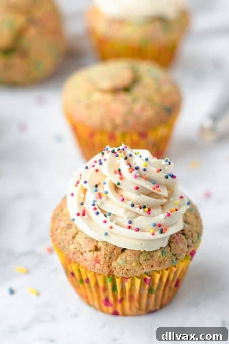 Cupcakes with sprinkles and cake batter flavor.