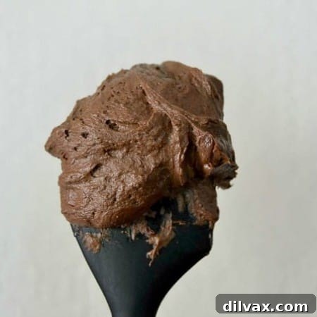 A rich chocolate buttercream frosting perfect for cakes, cupcakes and cookie cups!