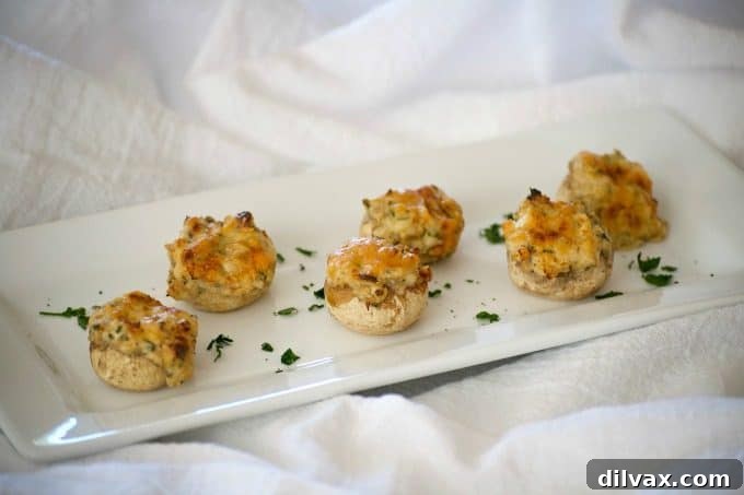 These Cream Cheese Stuffed Mushrooms are button mushrooms filled with cream cheese and a simple season mixture. They're a simple and delicious appetizer that won't last long once they're set out!