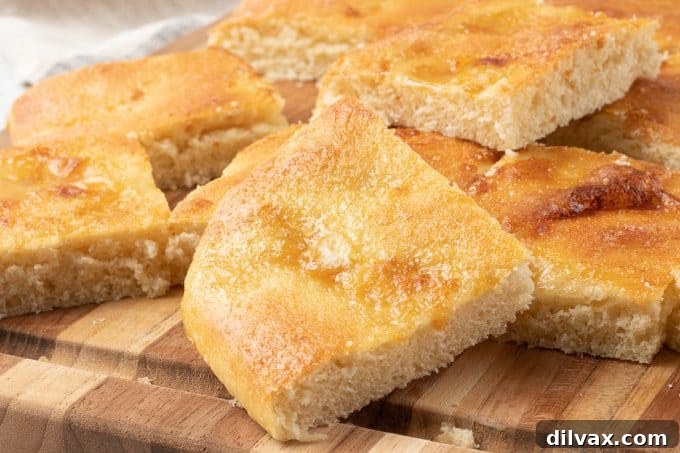 Coca Flatbread 2 Deliciously baked Spanish Coca Bread, golden and inviting.