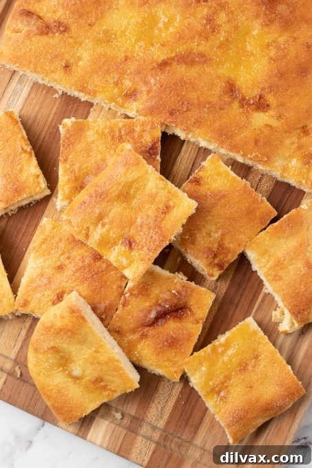 Coca Flatbread 8 Segments of a delectable Spanish sweet bread, artfully presented.