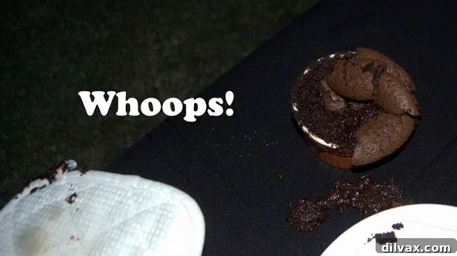 Brownie Bites 5 A freshly baked warm brownie cup, slightly tilted after a small mishap