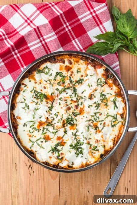 A finished Skillet Lasagna with spinach and melted cheese.