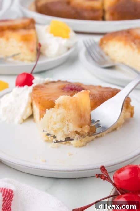 Caramelized Pineapple Flip Cake 12 A tempting bite of pineapple cake, showing the moist crumb and fruit topping.