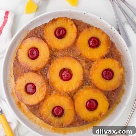 Caramelized Pineapple Flip Cake 13 Cherries, pineapple on a yellow cake.