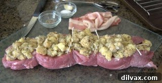 A 'Pin It' image featuring the delicious Stuffed Pork Tenderloin, ready to be saved on Pinterest.